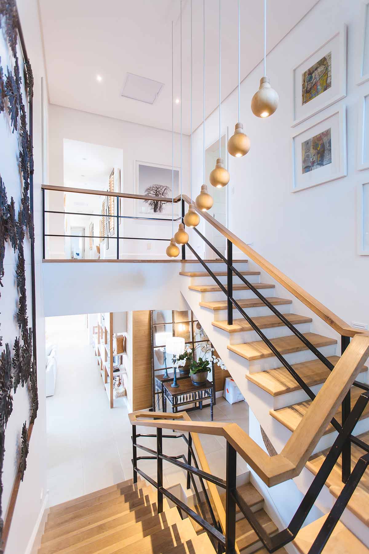 Staircase with wall art on wall